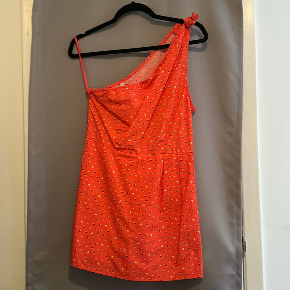 Red romper.